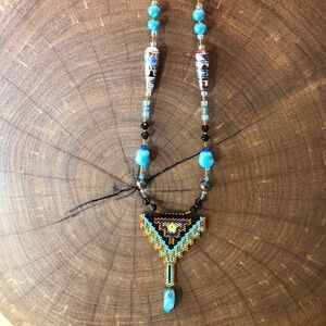 Turquoise pendant hand beaded necklace with magnetic closure.
